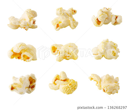 Separated popcorn pieces making crunchy snack on white background Separated popcorn pieces making crunchy snack on white background 136268297