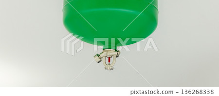 Automated Fire Extinguisher set in building.  136268338