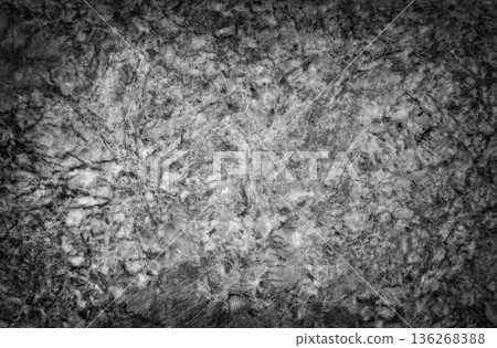 Abstract black and white textured background with intricate patterns resembling natural stone or marble, suitable for various design applications and artistic projects 136268388