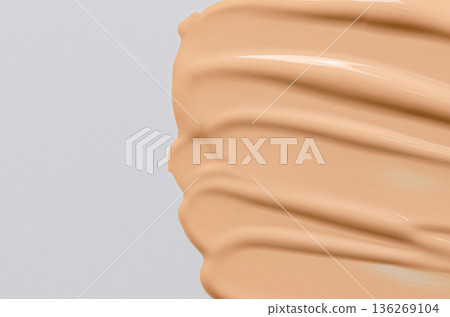 Skin foundation or makeup base. Cosmetic product. 136269104