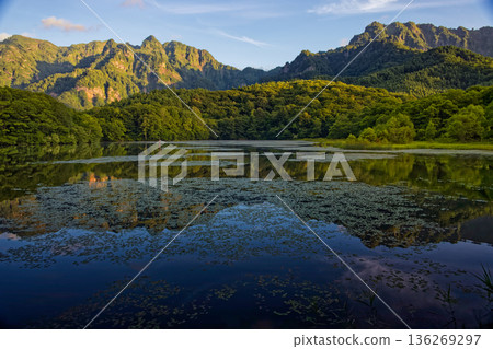 Morning view of the Togakushi mountain range from Kagami Pond 136269297