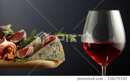 Red wine with blue cheese, figs, walnuts, and rosemary. Red wine with blue cheese, figs, walnuts, and rosemary. 136270109