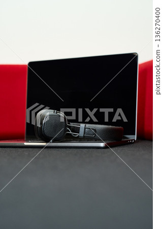 Modern Workspace - Laptop and Headphones 136270400