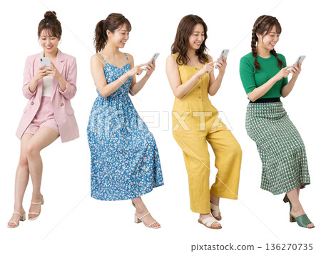 Set of 4 women in their 20s sitting and using smartphones, full-body cutout, transparent PNG, casual 136270735