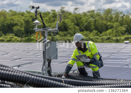 Engineer Checking and working setup Floating solar panels or solar cell Platform system on the lake.  136271364