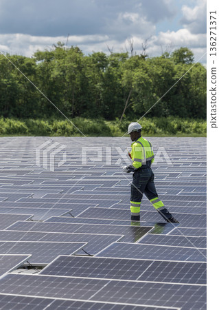 Engineer Checking and working setup Floating solar panels or solar cell Platform system on the lake. Engineer Checking and working setup Floating solar panels or solar cell Platform system on the lake. 136271371