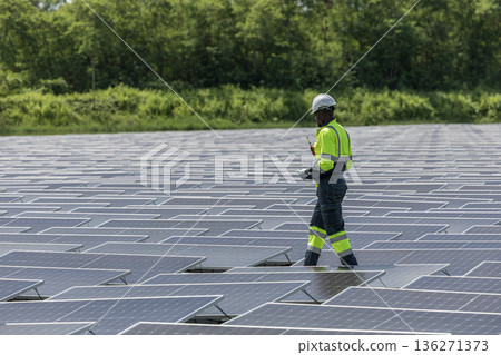 Engineer Checking and working setup Floating solar panels or solar cell Platform system on the lake. Engineer Checking and working setup Floating solar panels or solar cell Platform system on the lake. 136271373