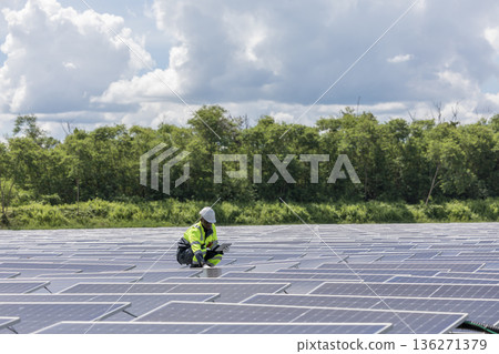 Engineer Checking and working setup Floating solar panels or solar cell Platform system on the lake. Engineer Checking and working setup Floating solar panels or solar cell Platform system on the lake. 136271379