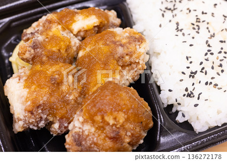 Delicious deep-fried chicken bento with grated daikon radish and ponzu sauce Delicious deep-fried chicken bento with grated daikon radish and ponzu sauce 136272178