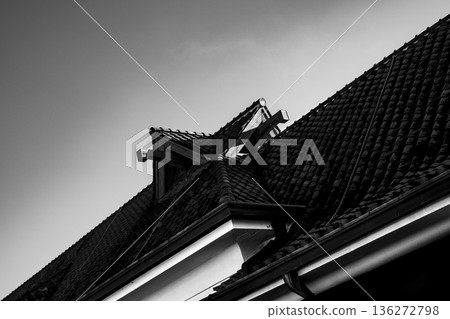 The roof structure of Japanese architecture stands out against the blue sky The roof structure of Japanese architecture stands out against the blue sky 136272798