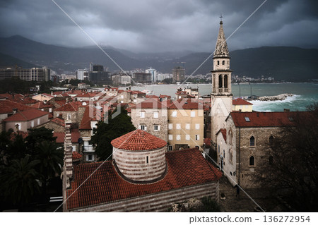Old town coastal cityscape with historic church and bell tower 136272954