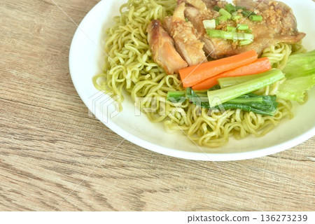Chinese vegetable noodles slice grilled chicken with Teriyaki Japanese sauce and cabbage on plate Chinese vegetable noodles slice grilled chicken with Teriyaki Japanese sauce and cabbage on plate 136273239