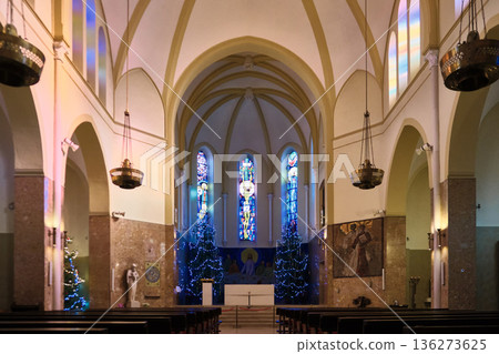 Church interior with altar and stained glass windows Church interior with altar and stained glass windows 136273625