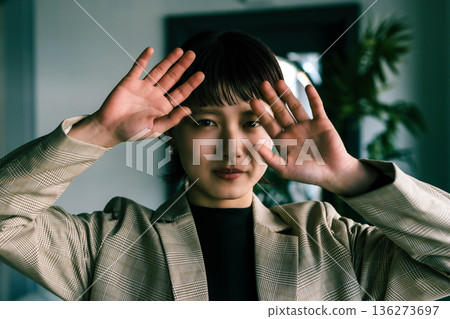 Hands in front of face Hands in front of face 136273697