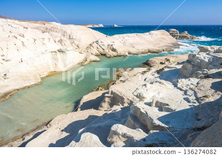 Unique white rock formations and turquoise waters of Sarakiniko beach, Milos Greece. Unique white rock formations and turquoise waters of Sarakiniko beach, Milos Greece. 136274082