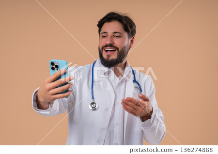 Male Doctor Providing Online Medical Consultation Video Call, remote telehealth Male Doctor Providing Online Medical Consultation Video Call, remote telehealth 136274888