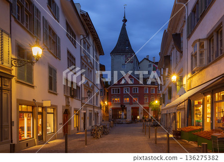 Sunrise View of Quiet Street and Historic Tower in Zurich Old Town 136275382