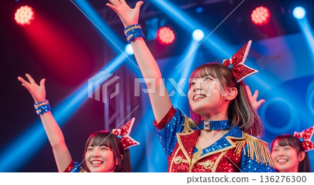 Idol group dancing on stage 136276300