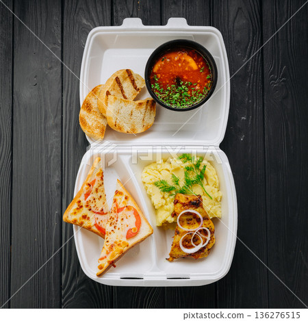 Takeout solyanka soup with mashed potatoes, chicken and cheese toast Takeout solyanka soup with mashed potatoes, chicken and cheese toast 136276515