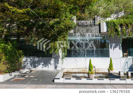 Facade building with waterfall and greenery plant, Fukuoka Facade building with waterfall and greenery plant, Fukuoka 136276588