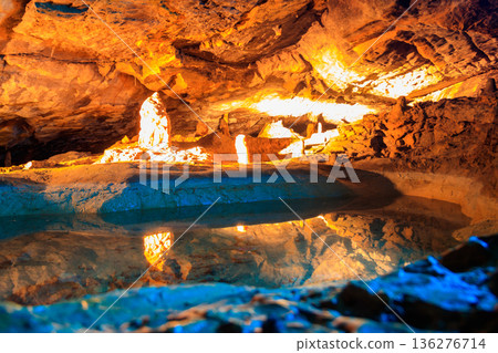 St. Beatus Caves with stalactites and stalagmites below Beatenberg near Interlaken in Bern canton in Switzerland St. Beatus Caves with stalactites and stalagmites below Beatenberg near Interlaken in Bern canton in Switzerland 136276714
