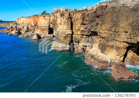 Boca do Inferno (Hell's Mouth) is a unique rock formation on the edge of the ocean in Cascais, Portugal Boca do Inferno (Hell's Mouth) is a unique rock formation on the edge of the ocean in Cascais, Portugal 136276765