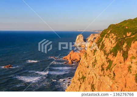 View of the Atlantic Ocean from Cabo da Roca. Cabo da Roca or Cape Roca is westernmost cape of mainland Portugal, continental Europe and the Eurasian land mass 136276766