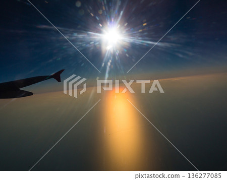 Beautiful white clouds and blue sky from plane Beautiful white clouds and blue sky from plane 136277085