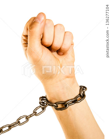 Chained man hands with chain around wrists 136277104