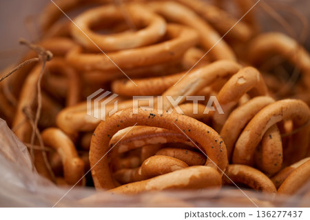 A bunch of fresh vanilla bagels in the basket A bunch of fresh vanilla bagels in the basket 136277437