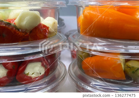 Assorted Stuffed Peppers and Marinated Olives in Clear Plastic Containers Assorted Stuffed Peppers and Marinated Olives in Clear Plastic Containers 136277475