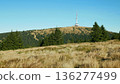 Praded old father Jeseniky mountains observation or lookout TV tower and television transmitter protected landscape area reservation meadow autumn trees hill famous tourist spot hill surrounded by 136277499