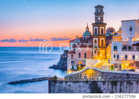 Atrani, Italy. Sunset colors on Amalfi Coast, colorful cliffside houses. 136277506