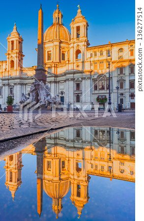 Rome, Italy. Golden hour in Piazza Navona with the famous Egyptian obelisk Rome, Italy. Golden hour in Piazza Navona with the famous Egyptian obelisk 136277514