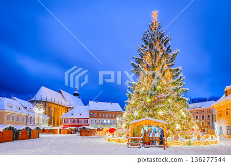 Brasov, Romania. Snowy winter holiday landscape with Christmas Market, Transylvania Brasov, Romania. Snowy winter holiday landscape with Christmas Market, Transylvania 136277544