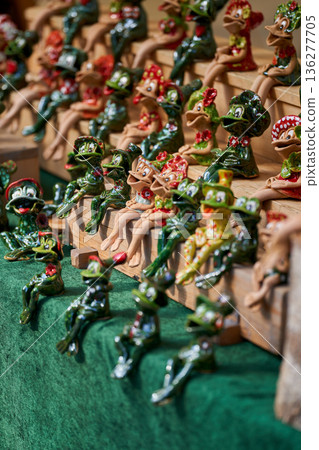 Cute figurines of frogs made of clay, handmade. Crafts Fair. Travel souvenir. 136277705