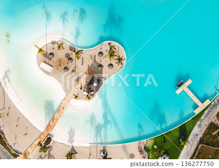Aerial drone view artificial beach lagoon island vacation resort 136277750