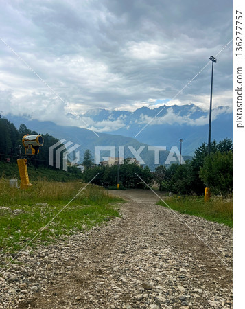 Road in the Sochi mountains in Krasnaya Polyana at 960 meters above sea level. Road in the Sochi mountains in Krasnaya Polyana at 960 meters above sea level. 136277757