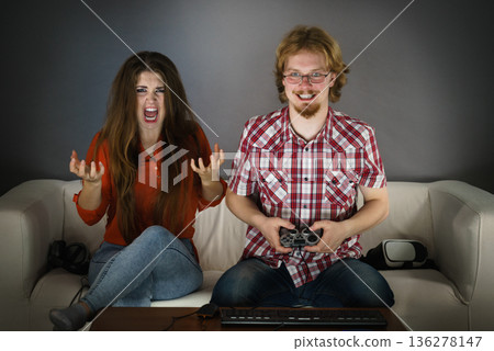 Woman is angry at playing man Woman is angry at playing man 136278147