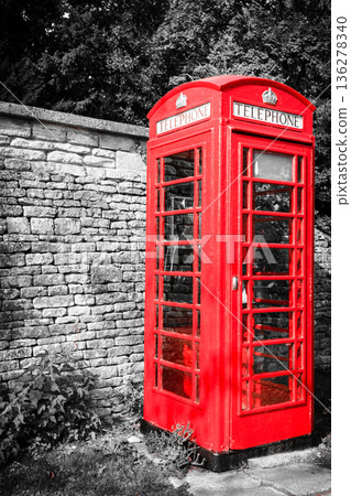 Traditional red telephone box in UK Traditional red telephone box in UK 136278340