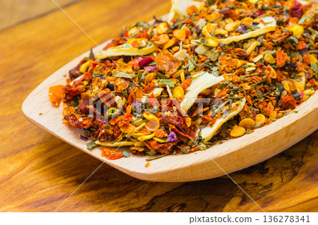 Colored spices for pasta mix on wooden spoon Colored spices for pasta mix on wooden spoon 136278341