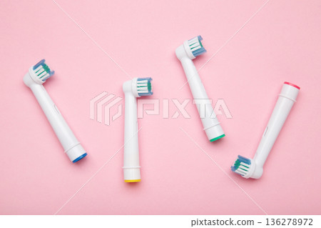 Mykolaiv, Ukraine - January 20, 2026: Oral-B Electric Toothbrush Replacement Brush Heads on pink background Mykolaiv, Ukraine - January 20, 2026: Oral-B Electric Toothbrush Replacement Brush Heads on pink background 136278972