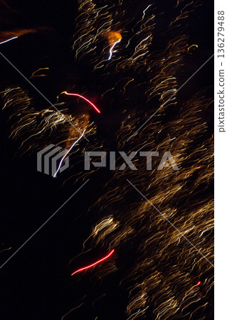 Fireworks celebrating the coming new year. Fireworks celebrating the coming new year. 136279488