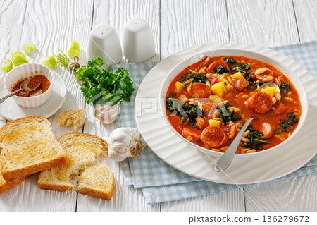 Swamp Soup with Sausage Kale White Bean and Orzo 136279672