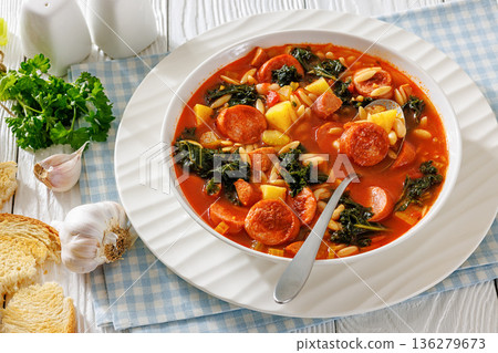 Swamp Soup with Sausage Kale White Bean and Orzo 136279673