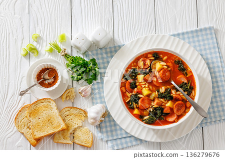 Swamp Soup with Sausage Kale White Bean and Orzo 136279676