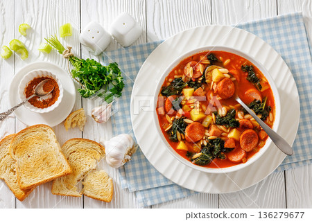 Swamp Soup with Sausage Kale White Bean and Orzo 136279677