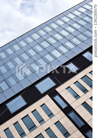 Minimalist architecture against a cloudy sky Minimalist architecture against a cloudy sky 136280070