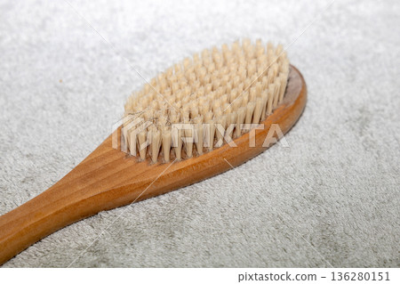 Natural bath accessories on light green towel. Natural bath accessories on light green towel. 136280151
