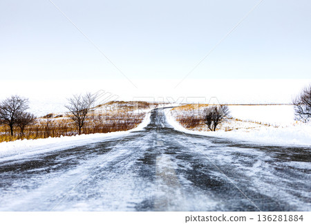 The road leading to Cape Notoro Lighthouse and the drift ice scenery in Abashiri, Hokkaido in mid-winter The road leading to Cape Notoro Lighthouse and the drift ice scenery in Abashiri, Hokkaido in mid-winter 136281884